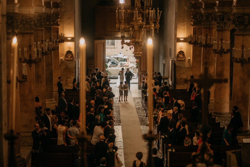 bride-enters-church-on-her-wedding day