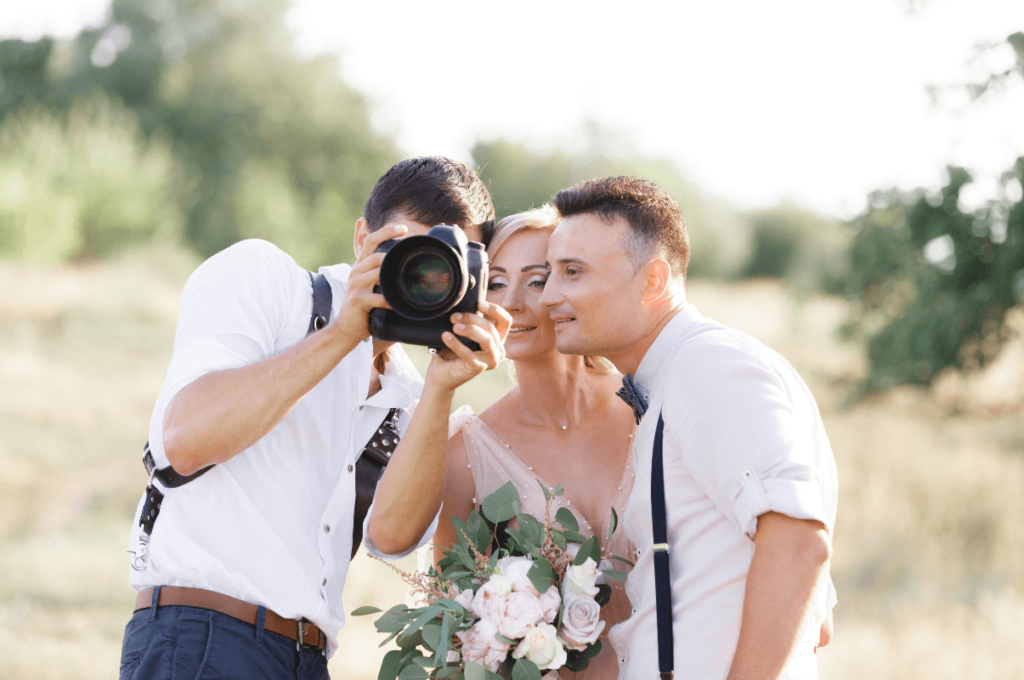 Bride-and-groom-with-the-photographer